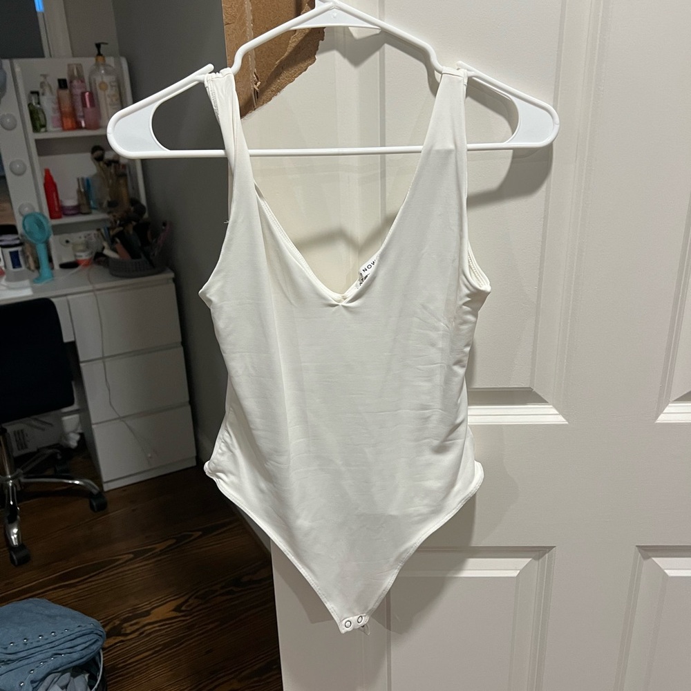 And Now This White Top bodysuit